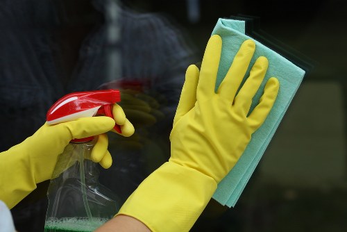 Cleaning staff applying health and safety procedures at the start of work