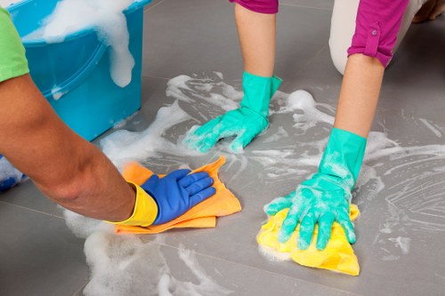 Balham Cleaners staff working safely with protective equipment