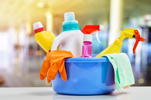 Cleaner using protective equipment while handling cleaning products